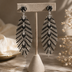 Noira Feather Statement Earrings