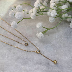 Gold Two-Layer Chain with Accent Stones & Dangling Charm