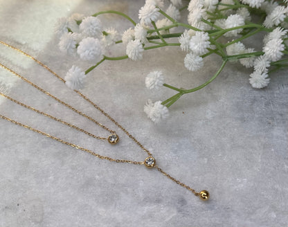 Gold Two-Layer Chain with Accent Stones & Dangling Charm
