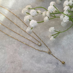 Gold Two-Layer Chain with Accent Stones & Dangling Charm