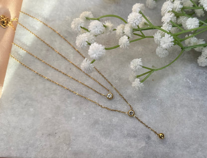 Gold Two-Layer Chain with Accent Stones & Dangling Charm