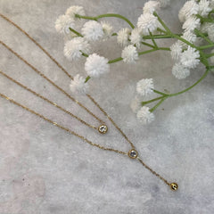 Gold Two-Layer Chain with Accent Stones & Dangling Charm