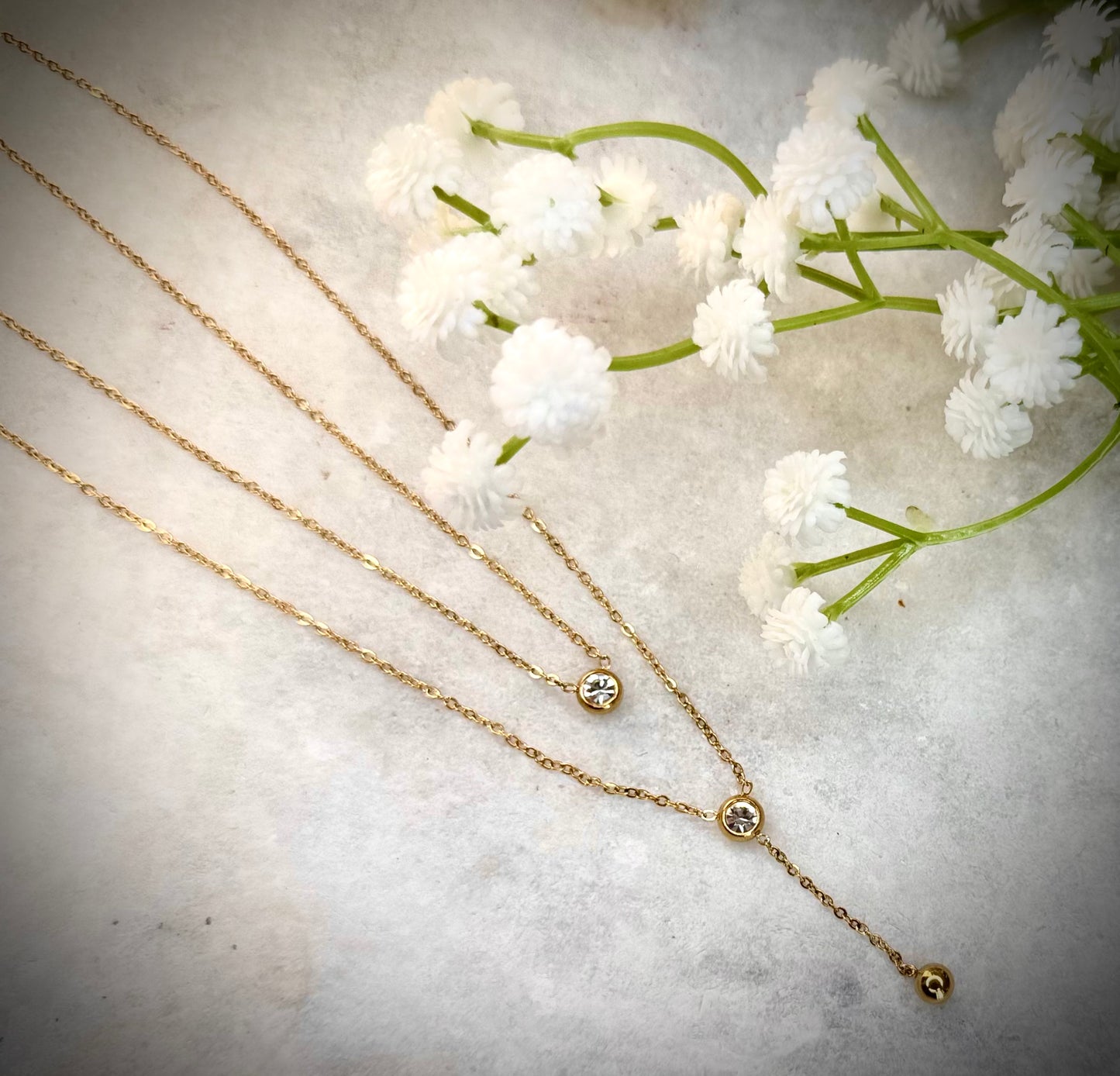 Gold Two-Layer Chain with Accent Stones & Dangling Charm